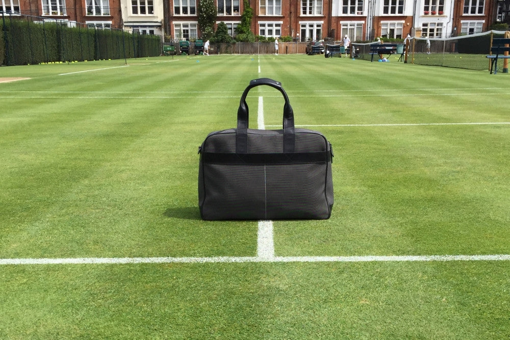 Epirus 24 hour tennis bag on grass court